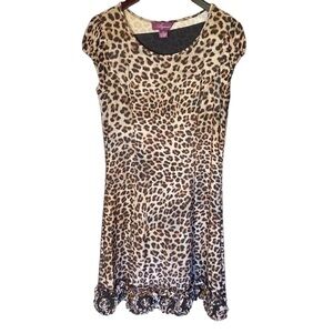 Leapord print size 10 dress with bottom ruffles and rosettes
